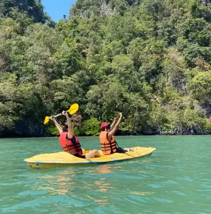 Paddling through narrow mangrove channels in Langkawi