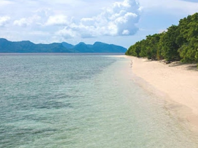 The beach of Kentut Island on jet ski tour, Langkawi